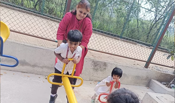 Kids playing on seesaw